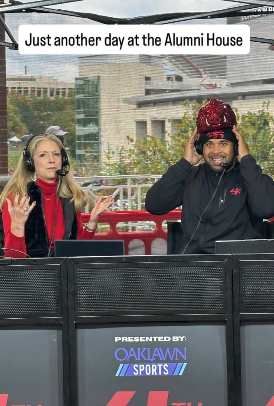 DJ interviews Arkansas Alumni Association President Brandy Cox during a 4th & Five pre-game show