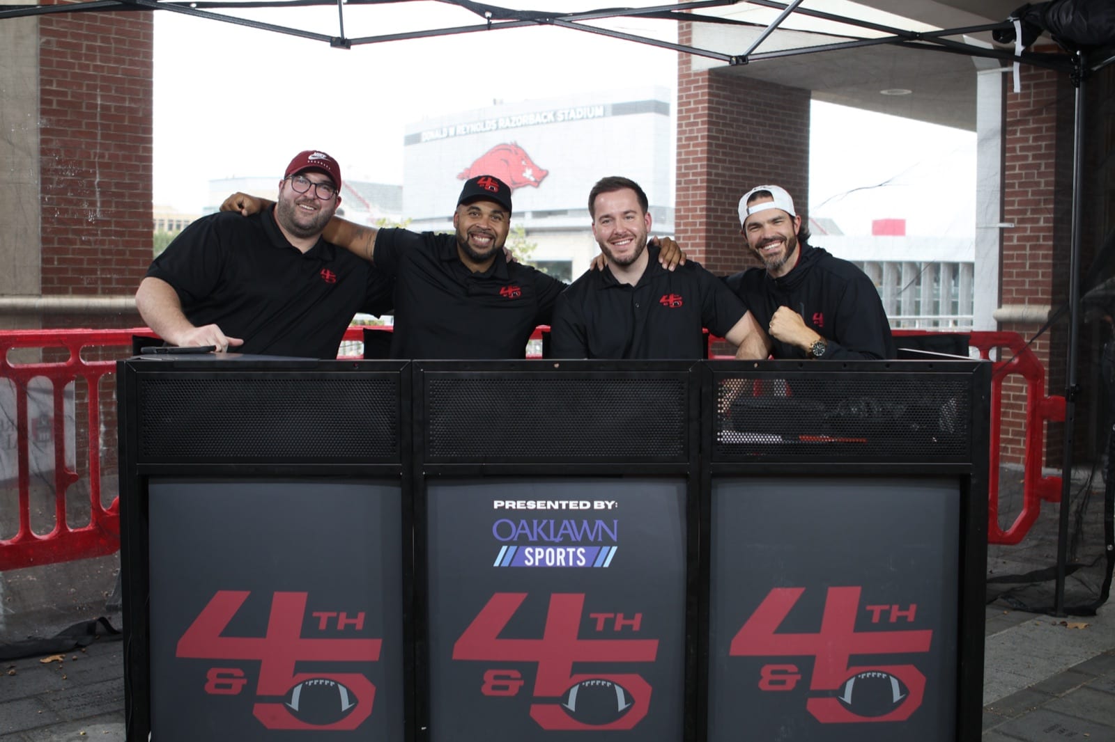The 4th & Five cast broadcasting live at Razorback Stadium, presented by Oaklawn Sports